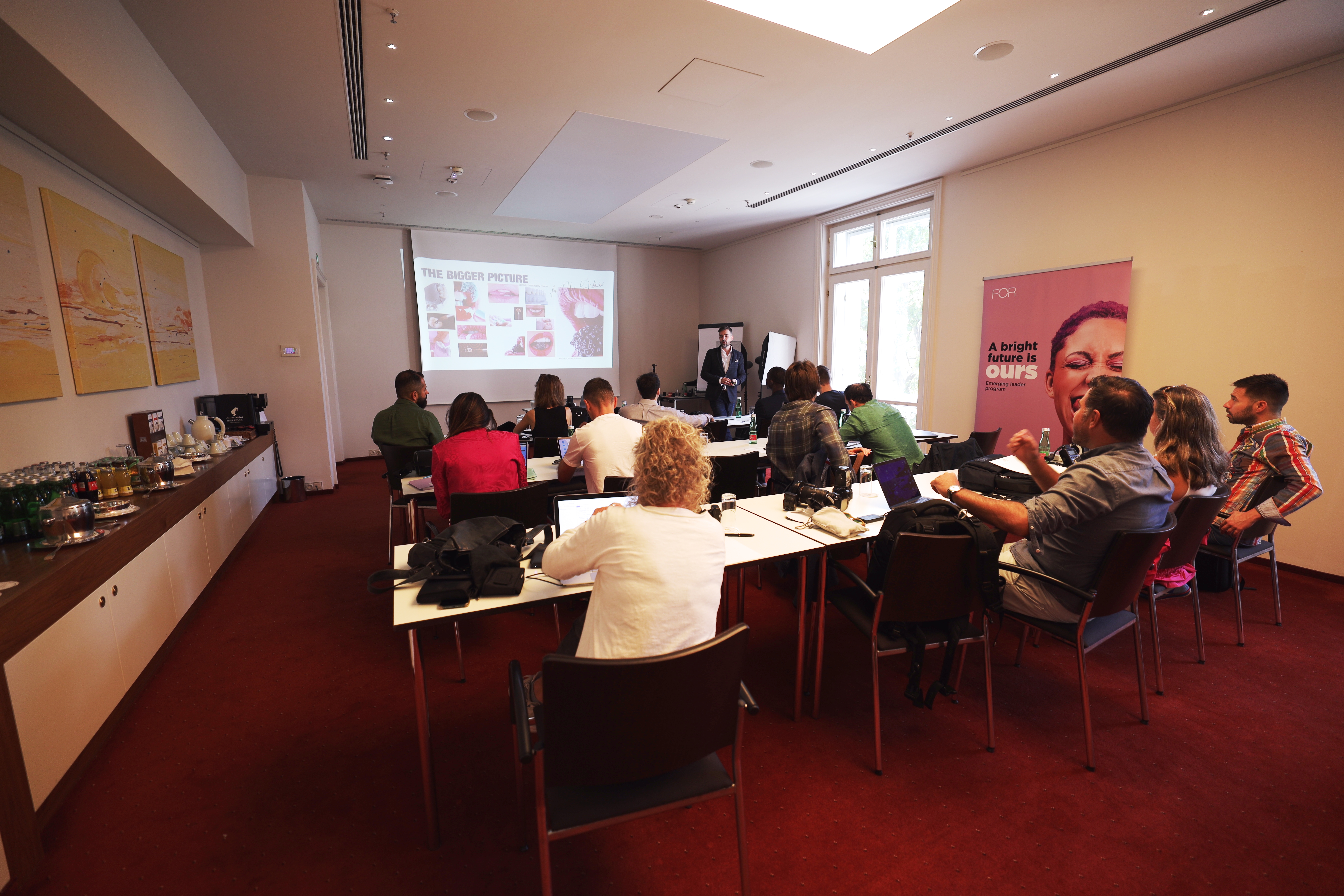 Dr Ljubicic explaining basics of photography to the ELs